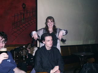 Fake shock-horror, pigtails raising up in fright.  Or something